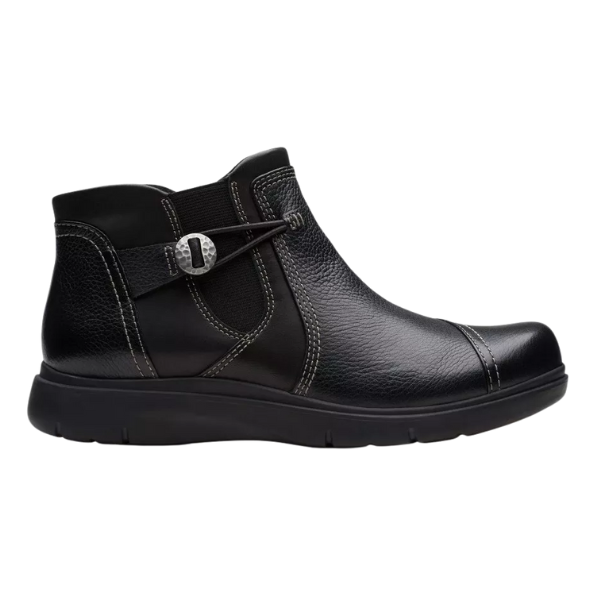 The Clarks Women's Certina Joy Wide Black by CLARKS features a round toe, decorative buckle strap, white stitching, elastic side panel, and cushioned sole—ideal for comfort seekers wanting stylish black ankle boots.