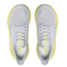 A pair of CLARKS Women's Pace Lime sneakers in gray with light yellow soles and accents, knit texture, laces, and logo on the tongue, shown from above on a white background.
