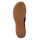 The image shows the sole of a CLARKS Women's Orlene Clog in Olive Combination Nubuck, with a light brown, textured tread featuring horizontal and wavy grooves for grip, displayed against a white background.