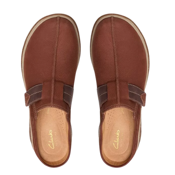 The CLARKS Women's Orlene Clog in Tan Combination Nubuck features tan insoles and dark brown elastic side panels—an ideal, comfortable slip-on for everyday casual wear, shown from above on a white background.