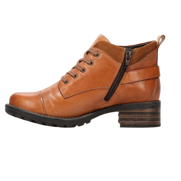 The TAOS Women's Mini Crave Caramel ankle boot features caramel leather, a low stacked heel, lace-up front, side zipper, and textured rubber sole, displayed in side profile on a white background.