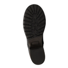 The image shows the bottom view of a TAOS Women's Uptown Black ankle boot sole, featuring a textured, rugged tread pattern with cross-shaped treads and grooves for traction, ideal for added arch support.