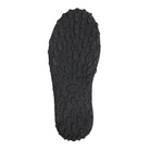 The image shows the black rubber sole of the TAOS Women's Trail Mix Charcoal boot, featuring an oval and circular textured tread for excellent grip. Its rugged design and supportive footbed make it perfect for outdoor activities.