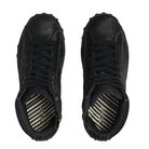 The TAOS Women's Trail Mix Black shoes feature a black lace-up design, striped black and white insoles with the taos logo by the heel, and a supportive footbed for enhanced comfort.