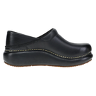 The Dansko Women's Platform Pro Cloud Black by DANSKO is a black leather clog with visible yellow stitching, a raised heel, and slip-resistant sole, shown from the side on a white background.