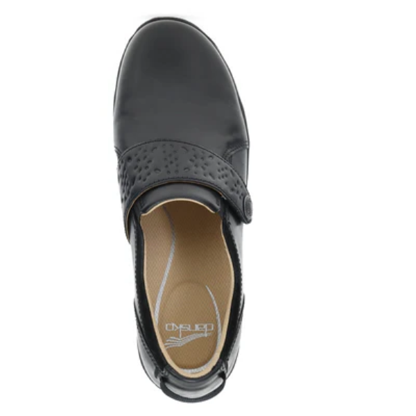 Top view of the DANSKO Women's Sallie Black shoe—orthotic-friendly with a perforated adjustable strap and beige lining. Designed for comfort and support, it’s a slip-resistant option inspired by Dansko styles.