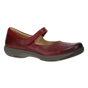 The DANSKO Women's Stacy Red is a single Mary Jane shoe featuring a hook-and-loop strap, perforated toe detailing, beige lining, arch support, and a gray rubber sole.