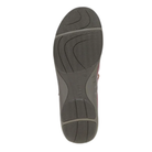The image shows the bottom view of a single Dankso Women's Stacy Red shoe with a gray, textured rubber sole featuring wavy tread patterns for grip. The sole has "DANSKO" embossed in the center, highlighting its slip-resistant design.
