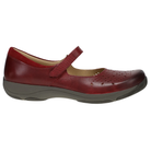 The DANSKO Women's Stacy Red Mary Jane shoe features a Velcro strap, perforated toe design, and a gray rubber sole for enhanced arch support.