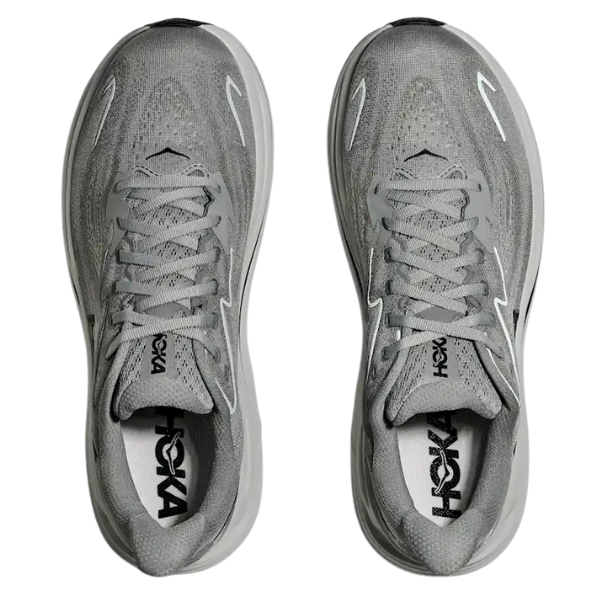 A pair of HOKA Men's Clifton 10 Galactic Grey running shoes seen from above, with cushioned comfort, visible laces, breathable mesh upper, and the HOKA logo on the insoles.