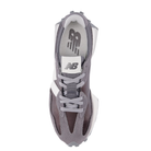 Top view of the New Balance Women's 327 Black/Castlerock running shoe with laces and logo, designed for comfort.