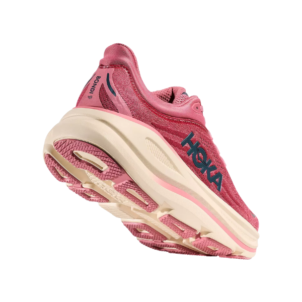 A HOKA Women's Bondi 9 Cranberry running shoe seen from below shows its thick sole and blue HOKA logo on the side.
