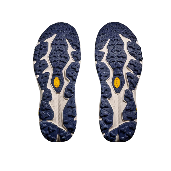 HOKA Men's Speedgoat 6 Grey/Blue Wide trail shoes with rugged soles, ideal for technical terrain.