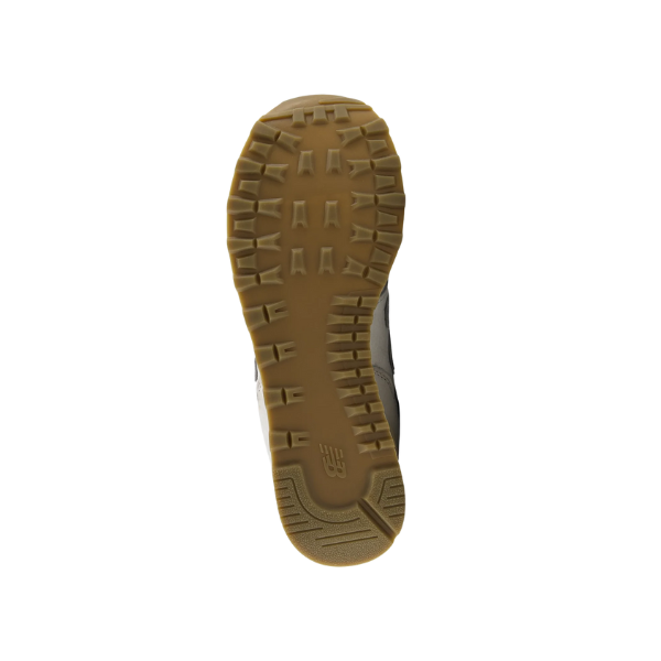 The image shows the textured sole of the NEW BALANCE Men's 574 Grey/Silver running shoe with its rugged tread.