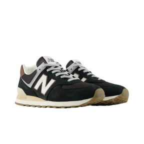 A pair of New Balance Men's 574 sneakers in brown and silver on a white background.
