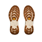 Top view of HOKA Women's Transport 2 Wide Black/White shoe soles with a rugged tread pattern on a white background.