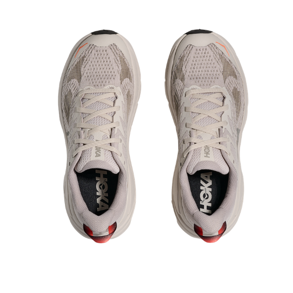 A pair of HOKA Women's Challenger 8 in Stucco/Asphalt with mesh uppers, black insoles, and red heel accents.