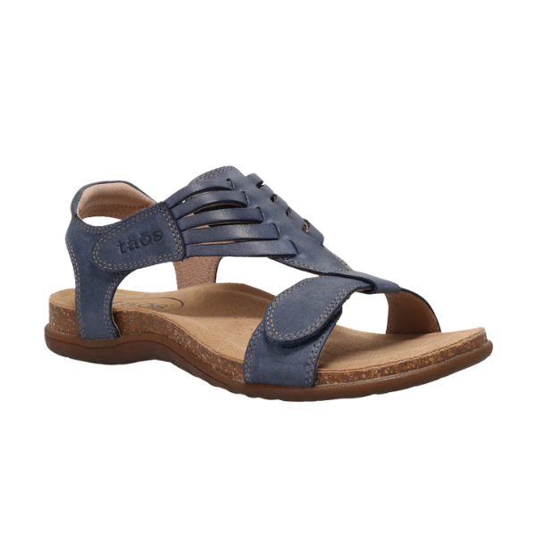 TAOS Taos Women's Wonderful Dark Blue sandal with adjustable straps, cork support, open toe, and cushioned tan sole.