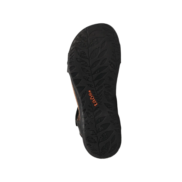 Black sole with textured leaf-like tread and orange TAOS logo, inspired by Italian leather. Taos Women's Wonderful Black.