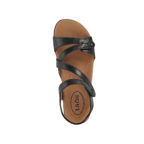 TAOS Women's Big Time Black sandal with SOFT SUPPORT footbed and adjustable hook & loop closures, top view.