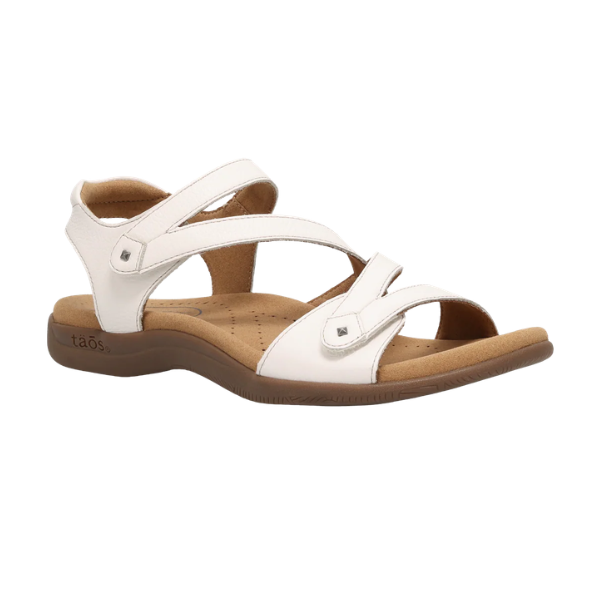 The TAOS Taos Women's Big Time White sandal offers comfort with SOFT SUPPORT and adjustable straps for casual wear.