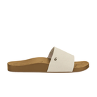 OLUKAI Women's Kipea Pono Tapa slide sandal with wide white strap and metallic detail; stylish and comfortable.