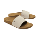 OLUKAI Women's Kipea Pono Tapa tan slide sandals with leaf-patterned, contoured footbed on a white background.