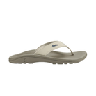 The OLUKAI Women's Ohana Tapa sandal in beige has a textured sole and thin strap—perfect comfort for any occasion.