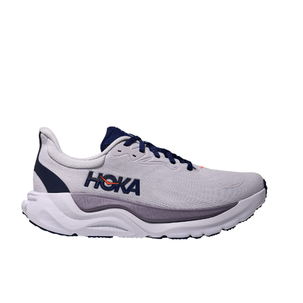 Light gray HOKA W Arahi 8 Starlight Glow/Blue shoes with navy laces, dark blue logo, thick white sole, side view.