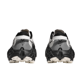 HOKA Women's Speedgoat 7 Wide running shoes in black, white, and gray shown from the back on a white background.