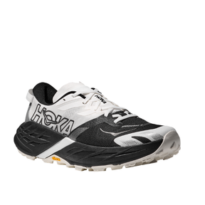 HOKA Women's Speedgoat 7 Wide in black and white, features thick sole, side logo, and rugged tread (angled view).