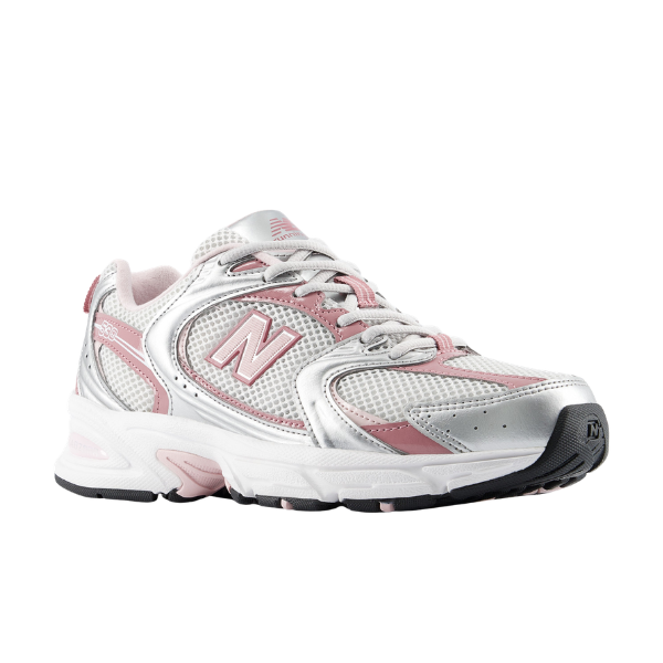 The New Balance Women's 530 Silver/Rose Wide features mesh panels, laces, and a white sole, shown at an angle.