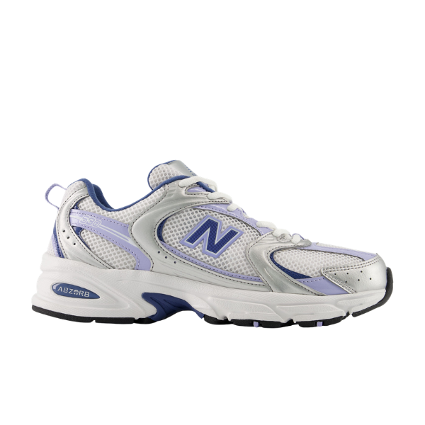 The NEW BALANCE Men's 530 Silver/Blue features mesh panels, purple-blue accents, and a thick rubber sole.