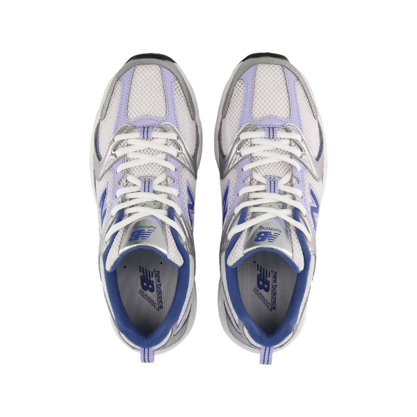 A pair of New Balance Men's 530 Silver/Blue running shoes viewed from above, featuring laces and blue accents.