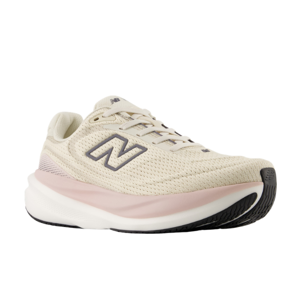 New Balance Women's 1080V15 Beige/White sneaker features a black N logo, pink midsole accent, and black-white outsole.