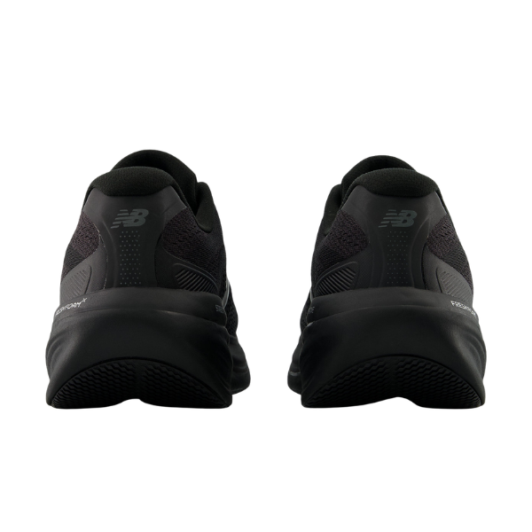 Rear view of NEW BALANCE Men's 860V15 Black/Black stability running shoes with dark soles on a white background.