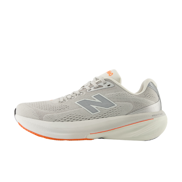 New Balance Men's 860V15 Grey/White features a mesh upper, silver N logo, and orange-accented sole for stability.