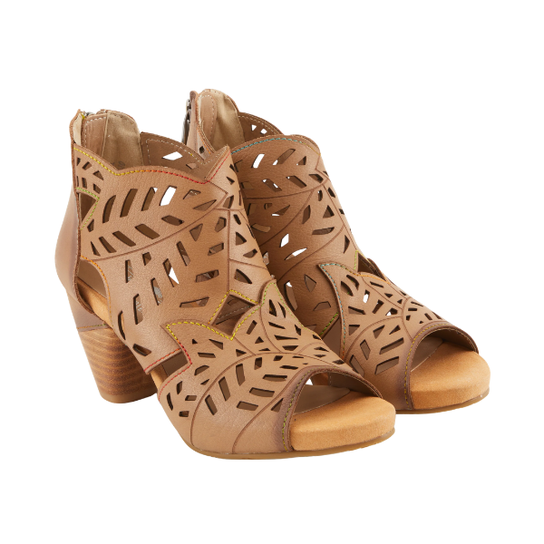 SpringStep Women's Icon Tan sandal by SPRING STEP, featuring cutout leaf patterns and open toes on a white background.