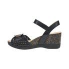 Dansko Women's Stella Black wedge sandal features a woven open toe, ankle strap, and speckled cork sole.