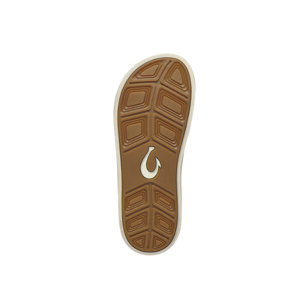 Dark brown wet grip outsole with textured tread and white OLUKAI logo, seen on the Ahi Kai Dark Java men's shoe.