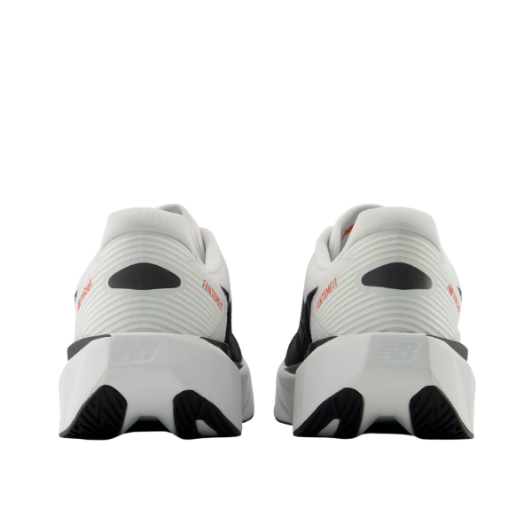 Rear view of New Balance Men's Rebel V5 White/Flame shoes with FuelCell midsole and NB heel logos.
