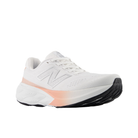 The New Balance Women's 880 V15 White/Orange features Fresh Foam X and a cushioned sole, ideal for road running.