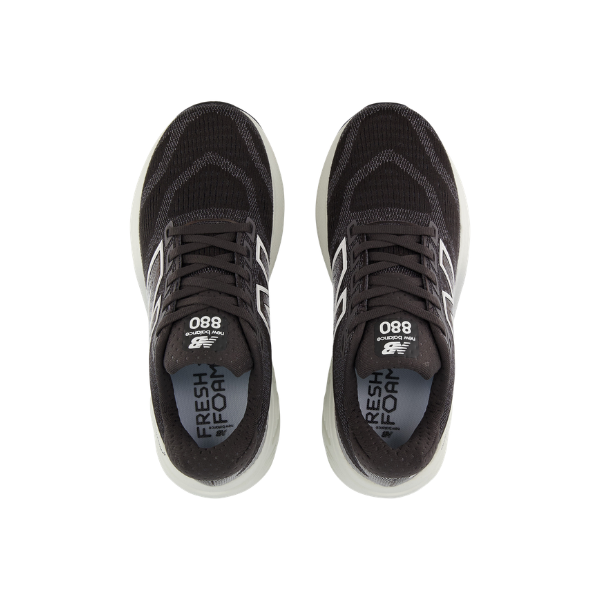 Top view of New Balance Women's 880 V15 Black/White running shoes with white soles and Fresh Foam insoles.