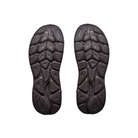 Pair of brown textured shoe soles shown from below, ideal for HOKA Men's Clifton 11 running shoes.