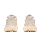 A pair of HOKA Women's Clifton 11 Alabaster/Oat Milk running shoes shown from the back on a white background.