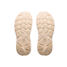 HOKA Women's Clifton 11 Wide Alab/Oat trainers feature beige cushioned soles with geometric tread, shown on white.