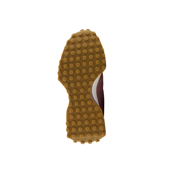 Brown sole of NEW BALANCE Women's 327 Rose/White shoes with circular treads, shown bottom-up on white background.