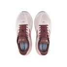 Top view of New Balance Women's 860V15 Pink running shoes with Fresh Foam X cushioning in white and pink.