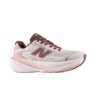 The NEW BALANCE Women's 860V15 Pink running shoe with Fresh Foam X, shown in white and pink side view.