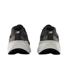 Rear view of NEW BALANCE Men’s 860V15 Wide in black/white with white soles on a white background.